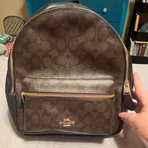 Brown/black coach backpack that has been in smoke free home. Carried 10 or less